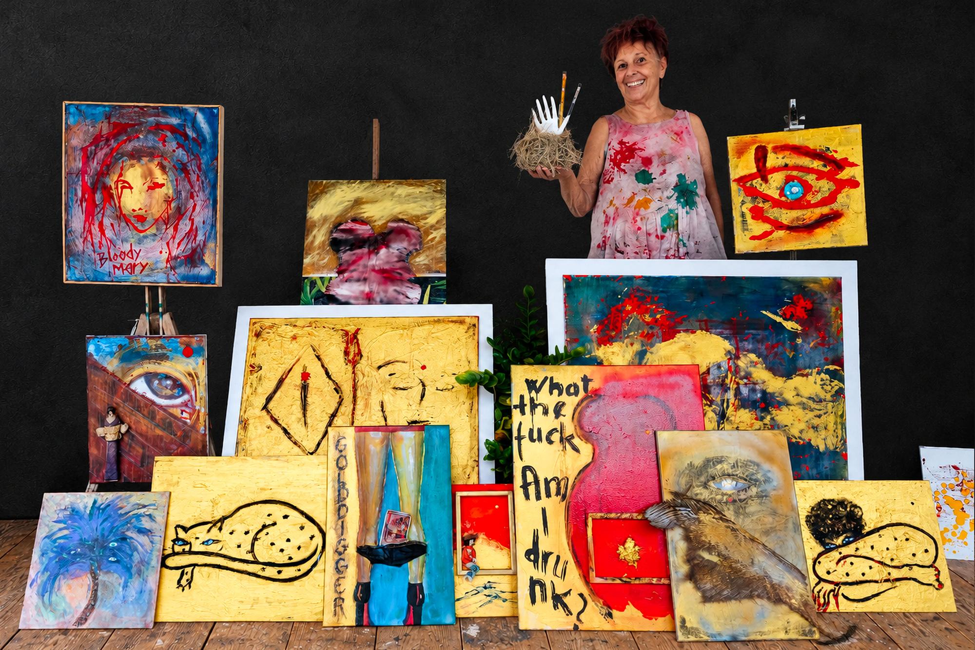 Nana Bors with eighteen of her paintings, studio, 2026